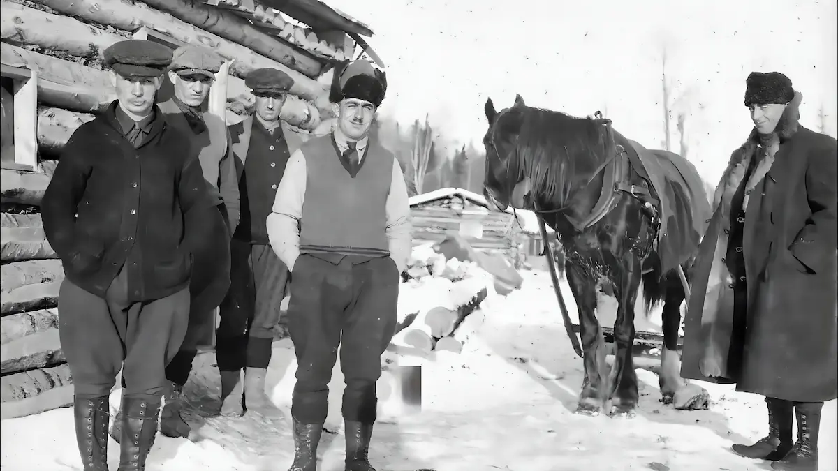 Missionaries at a winter camp with a horse